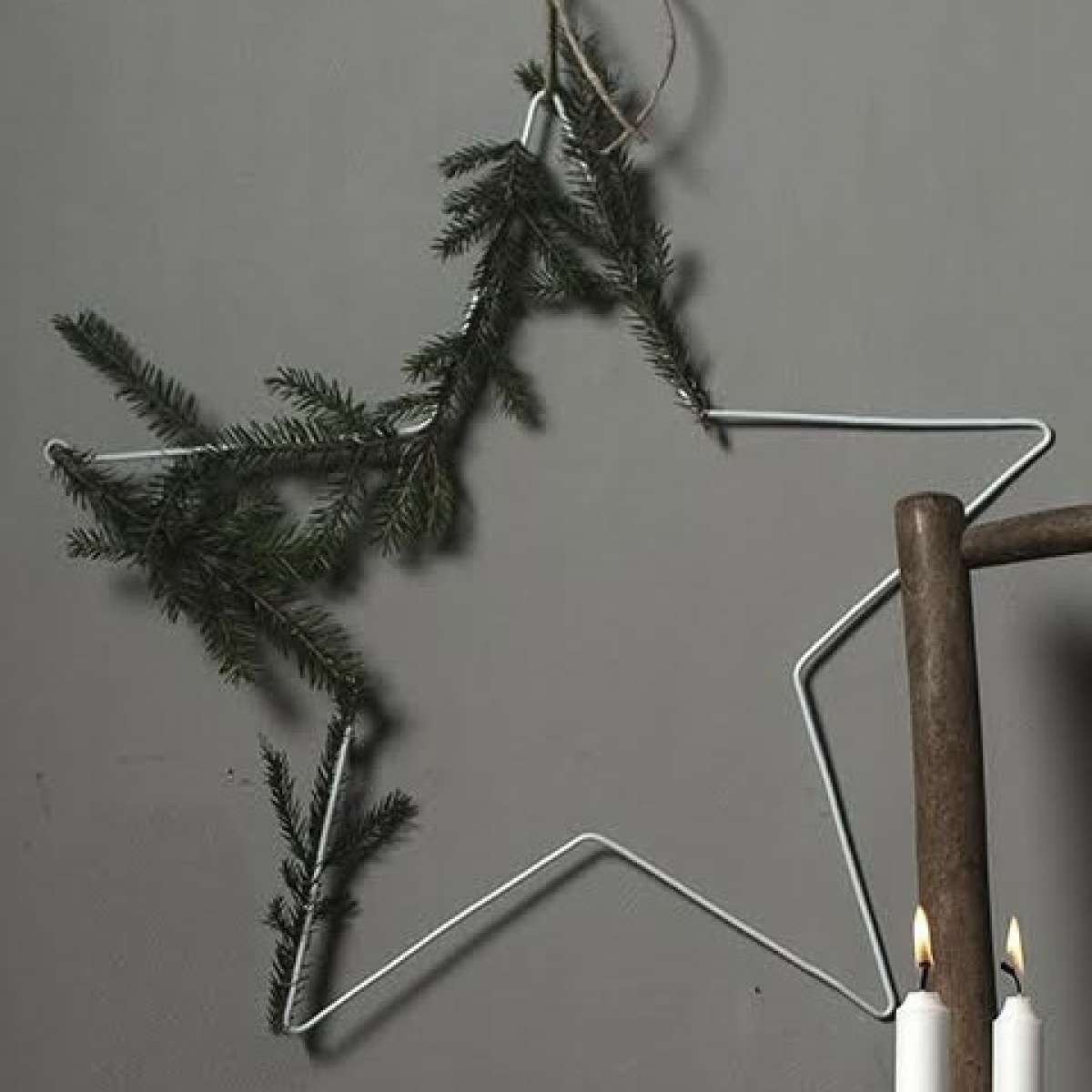 Immagine del prodotto Stella decorativa sospesa in Metallo laccato bianco (3 misure) | Storefactory