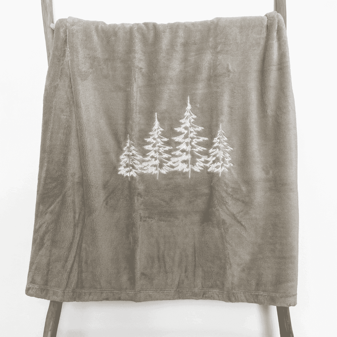 Immagine principale di Coperta Singola Alberi Ricamati in Microfibra 150x200 cm | Daunex