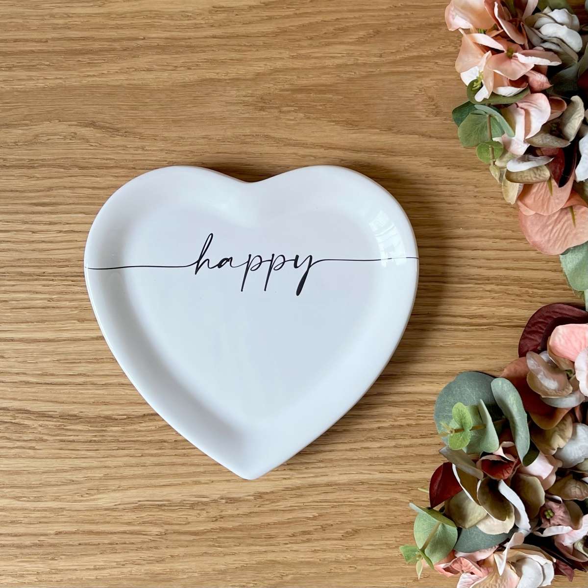 Immagine del prodotto Piatto a forma di Cuore in Ceramica con scritta Happy ø19x2 cm | Fiorditerra